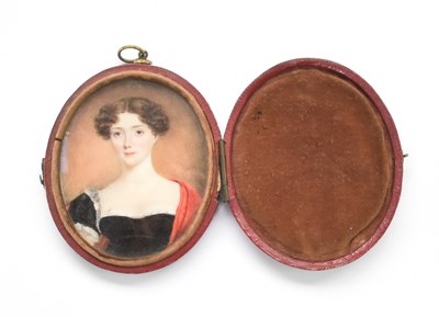 Lot 193 - A 19th century oval leather case portrait...