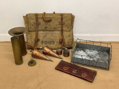 Lot 241 - A group of military items, comprising an...