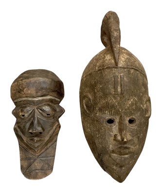 Lot 1028 - An African carved wooden tribal Pende Mbuya...