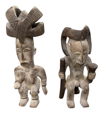 Lot 1007 - Two Nigerian carved wooden Orobo tribal...