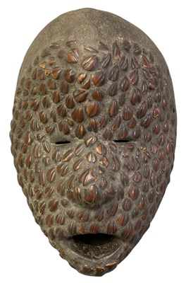 Lot 1046 - An African carved wooden tribal Kwele Gabon...