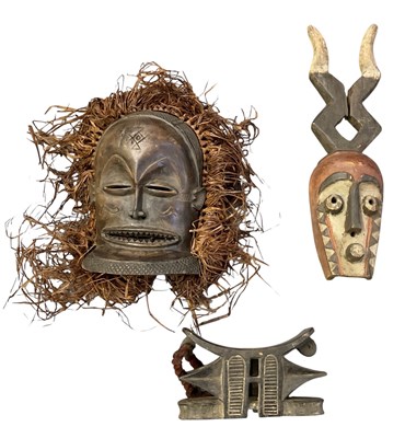 Lot 1008 - Two African carved wooden tribal masks...