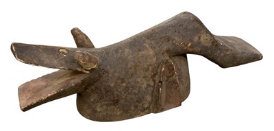 Lot 1036 - An African carved wooden tribal figure of a...