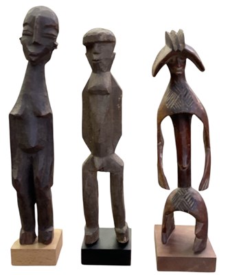 Lot 1009 - Three African carved wooden tribal fertility...