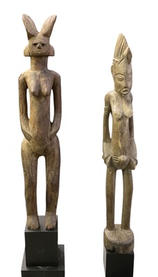 Lot 1010 - Two African carved wooden tribal figures,...
