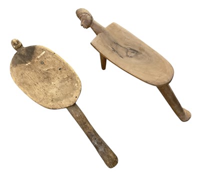 Lot 1031 - Two African carved wooden tribal figurally...