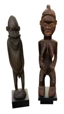 Lot 1020 - A Papua New Guinea Savi carved wooden figure,...
