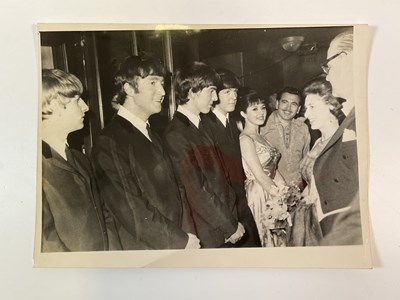 Lot 357 - THE BEATLES; an unpublished black and white...