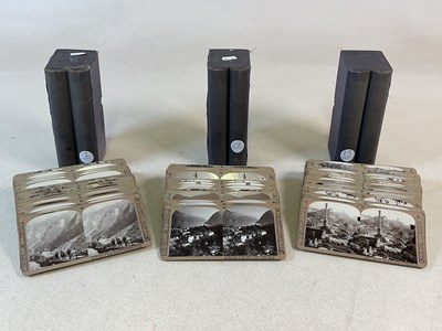 Lot 201 - Three double 'book' boxed stereograph cards,...
