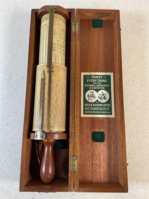 Lot 218 - A walnut cased Fuller calculator, with turned...