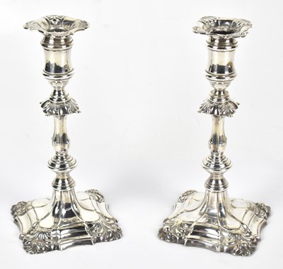 Lot 1070 - IS GREENBERG & CO; a pair of late Victorian Georgian style candlesticks