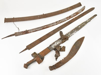 Lot 1348 - Three Eastern swords including a kukri and two...