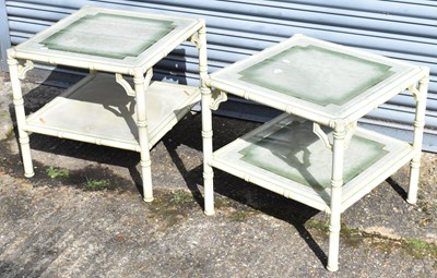 Lot 87 - A pair of decorative cream and green painted...