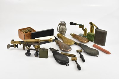 Lot 1528 - A collection of powder flasks, crimping tools,...