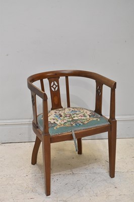 Lot 296 - An Edwardian mahogany and inlaid tub chair.