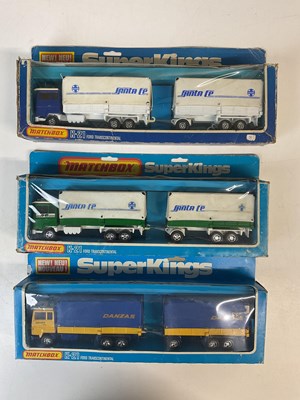Lot 51 - MATCHBOX SUPERKINGS; three K-21 Ford trans...