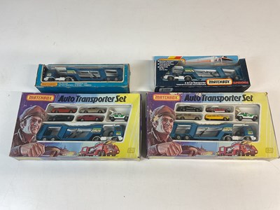 Lot 23 - MATCHBOX SUPERKINGS; car transport sets, two G-...