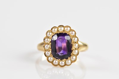 Lot 2359 - An 18ct yellow gold seed pearl and amethyst...