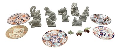 Lot 1076 - Five Japanese porcelain plates, including an...