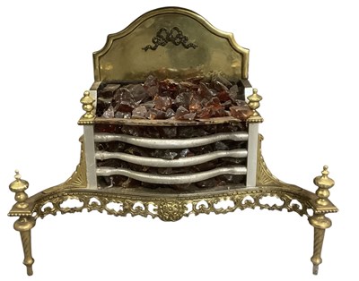 Lot 49 - A modern electrical brass fire grate, in the...