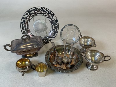 Lot 565 - A loaded sterling silver twin handled cup and...