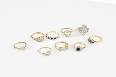 Lot 2433 - A 9ct yellow gold illusion set crossover dress...