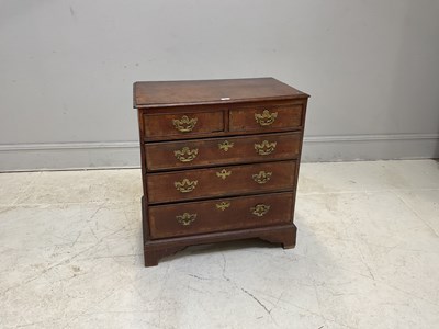 Lot 228 - A 19th century oak chest of two short over...