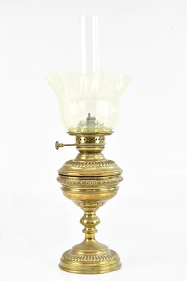 Lot 2050 - A late 19th century brass oil lamp, height 60cm.