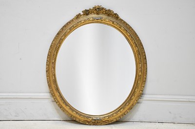 Lot 31 - A 19th century gilt framed oval wall mirror,...