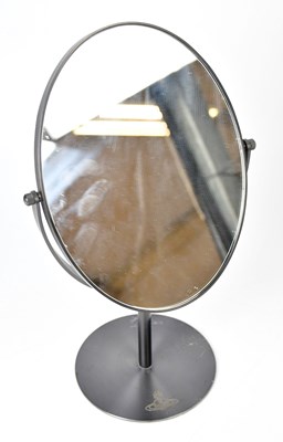 Lot 38 - VIVIENNE WESTWOOD; a matte black framed oval...