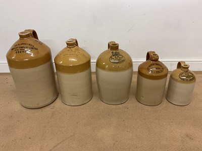 Lot 186 - Five stoneware flagons, all with southwest...