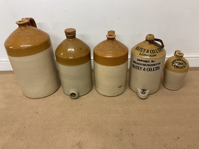 Lot 184 - Five stoneware flagons, all with company logos.