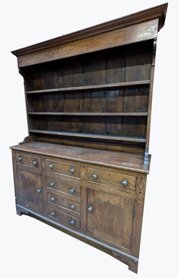 Lot 63 - A late George III oak high back dresser, with...