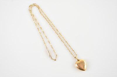 Lot 2203 - A 9ct yellow gold heart shaped pendant, on...