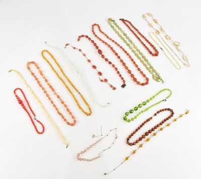 Lot 1054 - A collection of bead necklaces.