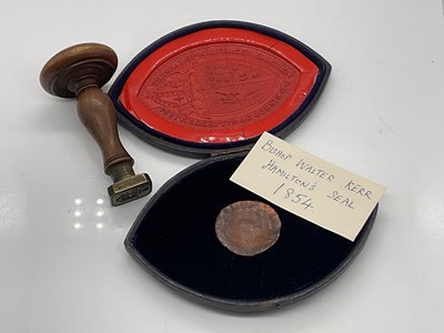 Lot 130 - A lozenge shaped red wax bishop's seal, in...