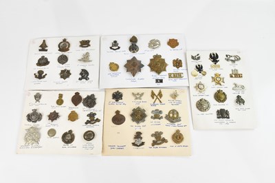 Lot 1225 - A large collection of WWI and later cap and...