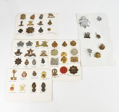 Lot 1227 - A large collection of military and other cap...