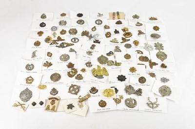 Lot 1262 - A large collection of military and other cap...