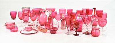 Lot 1789 - A collection of cranberry glass including jugs,...
