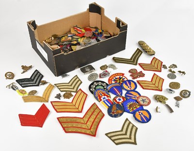 Lot 1286 - A large quantity of military and other badges,...