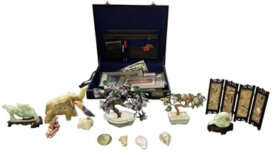 Lot 1071 - Two modern Chinese carved hardstone fruit...