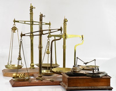 Lot 397 - Three sets of brass and mahogany balance scale...