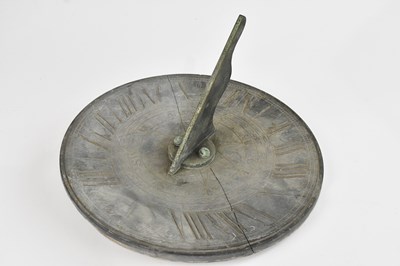Lot 240 - A slate sundial, diameter 33cm.