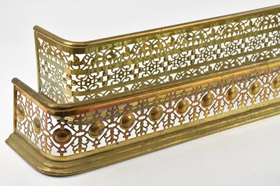 Lot 426 - Two pierced brass fenders, 125cm.