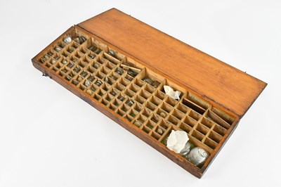 Lot 391 - A stained pine case containing a large...