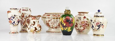 Lot 1565 - MOORCROFT; a table lamp in the 'Hibiscus'...