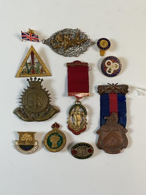 Lot 179 - A small group of vintage badges and medallions.