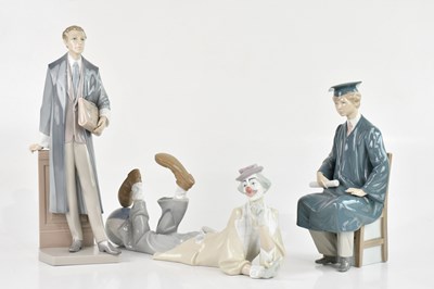 Lot 1666 - LLADRO; a group of three figures comprising...