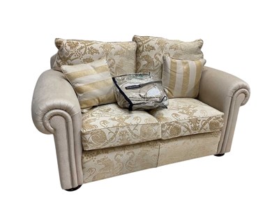 Lot 46 - DURESTA; a two seater settee with floral...